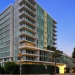 Mary Fitzgerald Instagram - 📍Four Seasons Residences - 9000 W. 3rd St. #201 - $3,299,000 2 Beds / 2 Baths / 2,380 Sq. Ft. Experience the epitome of luxury living at Four Seasons Private Residences, offering truly exceptional service and amenities. Enter Residence 201 via direct elevator granting access to a private customizable vestibule. Positioned on a coveted corner, the residence offers breathtaking views of lush, green trees, through floor-to-ceiling windows creating a serene and picturesque atmosphere. Inside, custom interiors designed by Martyn Lawrence Bullard offer two spacious bedrooms and two beautifully designed bathrooms, ensuring an abundance of space for relaxation and comfort. The chef's kitchen is thoughtfully equipped with top-of-the-line Gaggenau appliances, while the bathrooms offer a lavish retreat with floor-to-ceiling marble walls that exude sophistication and elegance. The living area and separate dining area are thoughtfully located along the glass corner allowing for an abundance of natural light and views. Residents enjoy a service-rich lifestyle with a world-class concierge, in-residence dining, housekeeping, and access to a private saltwater pool with cabanas. Additional amenities include a 19-seat IMAX Private Theatre Palais, a Fitness Center by Harley Pasternak, and a dedicated residents' lounge. Listing Agents: @jasonoppenheim @themarybonnet #realestate #condo #forsale #listed #sellingsunset #theoppenheimgroup