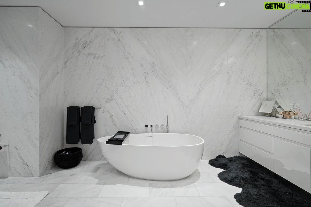 Mary Fitzgerald Instagram - 📍Four Seasons Residences - 9000 W. 3rd St. #201 - $3,299,000 2 Beds / 2 Baths / 2,380 Sq. Ft. Experience the epitome of luxury living at Four Seasons Private Residences, offering truly exceptional service and amenities. Enter Residence 201 via direct elevator granting access to a private customizable vestibule. Positioned on a coveted corner, the residence offers breathtaking views of lush, green trees, through floor-to-ceiling windows creating a serene and picturesque atmosphere. Inside, custom interiors designed by Martyn Lawrence Bullard offer two spacious bedrooms and two beautifully designed bathrooms, ensuring an abundance of space for relaxation and comfort. The chef's kitchen is thoughtfully equipped with top-of-the-line Gaggenau appliances, while the bathrooms offer a lavish retreat with floor-to-ceiling marble walls that exude sophistication and elegance. The living area and separate dining area are thoughtfully located along the glass corner allowing for an abundance of natural light and views. Residents enjoy a service-rich lifestyle with a world-class concierge, in-residence dining, housekeeping, and access to a private saltwater pool with cabanas. Additional amenities include a 19-seat IMAX Private Theatre Palais, a Fitness Center by Harley Pasternak, and a dedicated residents' lounge. Listing Agents: @jasonoppenheim @themarybonnet #realestate #condo #forsale #listed #sellingsunset #theoppenheimgroup