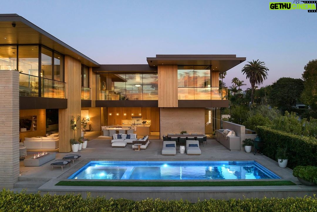Mary Fitzgerald Instagram - Just Listed in Manhattan Beach - 1001 1st St. - $29,900,000 6 Bed / 9 Bath / 9,479 Sq. Ft. The most impressive and high-quality Contemporary estate ever built in Manhattan Beach, featuring panoramic ocean views from every room. After a laborious multi-year build, this approximately 9,500 sq. ft. showstopper seamlessly fuses glass, cedar, and concrete into a triumphant architectural tour de force with a sense of permanence and grandeur. Integral to the structure and aesthetic of the home, the scalloped concrete walls seen on the exterior and interior walls resemble an undulating wave-like texture accomplished by custom milled formwork which complement the surrounding Pacific landscape. Custom cedar clads the remaining walls and ceilings, bringing warmth and visual impact throughout the sleek space. Double-height ceilings and oversized automated Otiima pocketing doors and windows create a sense of expansion within, as the home seamlessly unfolds into an extensive beautifully landscaped outdoor terrace and pool/spa perfect for California living. An additional shaded patio with fireplace is created by the deep cedar overhangs from the upper floor and the roof. Generously nestled on an extra-wide corner lot, the home is replete with 6 bedrooms plus an additional office/nursery, 9 bathrooms, home theater, game room, wine cellar, wet bar, and gym, with architecture by Laney LA. Additional amenities include 48 solar panels with Tesla Powerwalls, elevator, 14 zone A/C technology platform system, Control4 home automation, and 3-car garage with additional driveway parking. An exceptionally rare opportunity to own a meticulously crafted beach estate with soul and sophistication.