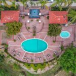 Mary Fitzgerald Instagram - JUST LISTED IN BRENTWOOD A TIMELESS, REMODELED RESIDENCE WITH PANORAMIC CANYON VIEWS AND SECURITY PATROL😊 🏠2305 CANYONBACK RD. - $3,490,000 Nestled amidst a beautiful canyon landscape, this contemporary residence spans an impressive 4.488 square feet and exudes timeless elegance Offering community 24-hour security patrol, this home ensures both serenity and safety in equal measure. The remodeled interior embraces a warm traditional aesthetic, creating an inviting atmosphere throughout. The grandeur of the living room is accentuated by its soaring 12-foot ceilings and expansive scale, providing an ideal backdrop for showcasing artwork. A gourmet chef's kitchen awaits adorned with top-of-the-line Wolf appliances. Entertaining quests is a joy in the generously-sized dining room, with separate breaktast area also ottering a more casual setting for daily meals Ascend the gracious circular stairwell to discover the primary suite, where panoramic vistas embrace the tranquil ambiance. Indulge in the spa-like bath replete with enormous slabs of white marble, and revel in the abundance of space within the walk-in closet. The upper level continues to impress with two additional en-suite bedrooms, each boasting high ceilings, beautitully updated bathrooms, and private balconies. Escape to the private and peaceful backyard with a built-in BBQ and grassy yard. Private attached 2-car garage. Communitv amenities include pool, tennis courts, and security patrol. 🛌 BEDS: 4 📏 SO. FT.: 4.488 💰 $3.490.000 🛁 BATHS: 4 🚘 PARKING: 2 CAR Listing Agents: @kanelk_k @jasonoppenheim