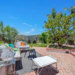Mary Fitzgerald Instagram - JUST LISTED IN BRENTWOOD A TIMELESS, REMODELED RESIDENCE WITH PANORAMIC CANYON VIEWS AND SECURITY PATROL😊 🏠2305 CANYONBACK RD. - $3,490,000 Nestled amidst a beautiful canyon landscape, this contemporary residence spans an impressive 4.488 square feet and exudes timeless elegance Offering community 24-hour security patrol, this home ensures both serenity and safety in equal measure. The remodeled interior embraces a warm traditional aesthetic, creating an inviting atmosphere throughout. The grandeur of the living room is accentuated by its soaring 12-foot ceilings and expansive scale, providing an ideal backdrop for showcasing artwork. A gourmet chef's kitchen awaits adorned with top-of-the-line Wolf appliances. Entertaining quests is a joy in the generously-sized dining room, with separate breaktast area also ottering a more casual setting for daily meals Ascend the gracious circular stairwell to discover the primary suite, where panoramic vistas embrace the tranquil ambiance. Indulge in the spa-like bath replete with enormous slabs of white marble, and revel in the abundance of space within the walk-in closet. The upper level continues to impress with two additional en-suite bedrooms, each boasting high ceilings, beautitully updated bathrooms, and private balconies. Escape to the private and peaceful backyard with a built-in BBQ and grassy yard. Private attached 2-car garage. Communitv amenities include pool, tennis courts, and security patrol. 🛌 BEDS: 4 📏 SO. FT.: 4.488 💰 $3.490.000 🛁 BATHS: 4 🚘 PARKING: 2 CAR Listing Agents: @kanelk_k @jasonoppenheim