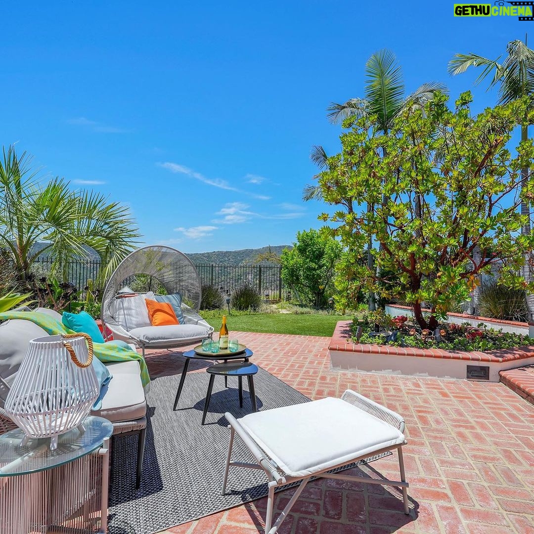 Mary Fitzgerald Instagram - JUST LISTED IN BRENTWOOD A TIMELESS, REMODELED RESIDENCE WITH PANORAMIC CANYON VIEWS AND SECURITY PATROLπ π 2305 CANYONBACK RD. - $3,490,000 Nestled amidst a beautiful canyon landscape, this contemporary residence spans an impressive 4.488 square feet and exudes timeless elegance Offering community 24-hour security patrol, this home ensures both serenity and safety in equal measure. The remodeled interior embraces a warm traditional aesthetic, creating an inviting atmosphere throughout. The grandeur of the living room is accentuated by its soaring 12-foot ceilings and expansive scale, providing an ideal backdrop for showcasing artwork. A gourmet chef's kitchen awaits adorned with top-of-the-line Wolf appliances. Entertaining quests is a joy in the generously-sized dining room, with separate breaktast area also ottering a more casual setting for daily meals Ascend the gracious circular stairwell to discover the primary suite, where panoramic vistas embrace the tranquil ambiance. Indulge in the spa-like bath replete with enormous slabs of white marble, and revel in the abundance of space within the walk-in closet. The upper level continues to impress with two additional en-suite bedrooms, each boasting high ceilings, beautitully updated bathrooms, and private balconies. Escape to the private and peaceful backyard with a built-in BBQ and grassy yard. Private attached 2-car garage. Communitv amenities include pool, tennis courts, and security patrol. π BEDS: 4 π SO. FT.: 4.488 π° $3.490.000 π BATHS: 4 π PARKING: 2 CAR Listing Agents: @kanelk_k @jasonoppenheim