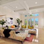 Mary Fitzgerald Instagram - JUST LISTED IN BRENTWOOD A TIMELESS, REMODELED RESIDENCE WITH PANORAMIC CANYON VIEWS AND SECURITY PATROL😊 🏠2305 CANYONBACK RD. - $3,490,000 Nestled amidst a beautiful canyon landscape, this contemporary residence spans an impressive 4.488 square feet and exudes timeless elegance Offering community 24-hour security patrol, this home ensures both serenity and safety in equal measure. The remodeled interior embraces a warm traditional aesthetic, creating an inviting atmosphere throughout. The grandeur of the living room is accentuated by its soaring 12-foot ceilings and expansive scale, providing an ideal backdrop for showcasing artwork. A gourmet chef's kitchen awaits adorned with top-of-the-line Wolf appliances. Entertaining quests is a joy in the generously-sized dining room, with separate breaktast area also ottering a more casual setting for daily meals Ascend the gracious circular stairwell to discover the primary suite, where panoramic vistas embrace the tranquil ambiance. Indulge in the spa-like bath replete with enormous slabs of white marble, and revel in the abundance of space within the walk-in closet. The upper level continues to impress with two additional en-suite bedrooms, each boasting high ceilings, beautitully updated bathrooms, and private balconies. Escape to the private and peaceful backyard with a built-in BBQ and grassy yard. Private attached 2-car garage. Communitv amenities include pool, tennis courts, and security patrol. 🛌 BEDS: 4 📏 SO. FT.: 4.488 💰 $3.490.000 🛁 BATHS: 4 🚘 PARKING: 2 CAR Listing Agents: @kanelk_k @jasonoppenheim