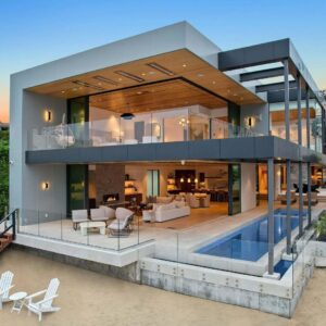 Mary Fitzgerald Instagram - Just Listed - 2201 Bayside Dr. - $27,995,000

5 Beds / 9 Baths / 9,129 Sq. Ft. / 11,921 Lot Size

This newly constructed custom estate offers exclusive Corona Del Mar waterfront living with intricate design touches and a harmonious blend of natural stone and wood elements. Consisting of 5 ensuite bedrooms and 9 bathrooms and boasting approximately 50 feet of private beachfront, it caters to water enthusiasts and offers shared ownership of one of the longest private docks on the west coast, capable of accommodating multiple yachts up to 100ft in length. Upon arrival, you will be greeted by meticulously landscaped surroundings, a striking grand pivot door, and a double height foyer that sets the tone for the residence. Inside, the space boasts European wide plank bleached oak flooring by Gaetano, illuminated floating staircases, and expansive glass features that fill the approximately 9,129 square feet of interiors with an abundance of natural light. The property seamlessly connects to its surroundings through slide-away pocket doors that open onto a heated patio, a zero-edge saltwater pool and spa, and a courtyard featuring a built-in Lynx Grill. The kitchen features custom Honed Calcatta Vagli slab countertops and backsplash, a 55" La Canche designer stove imported from Paris, a butler's pantry, and stained white oak cabinetry. Convenience is paramount, with a Waupaca elevator servicing all four floors, including the lower level, which encompasses a media area, a dry bar, and temperature controlled wine room. Upstairs, the owner's suite presents a heated wraparound balcony with mesmerizing water views, a living space with a fireplace, and two spa-like bathrooms, each complemented by its own walk-in closet. The top level reveals a lounge area that opens onto a rooftop deck with grass and sweeping views of the Newport Beach Harbor offering limitless ocean-view entertaining. Equipped with cutting-edge technology, the property also includes a nearly 3,000 sq. ft., 6+ car garage with epoxy flooring.

Listed by @briancharlesfurstenfeld @mskaylacardona @jasonoppenheim 

#theoppenheimgroup #realestate #luxurylifestyle #fyp #newlisting
