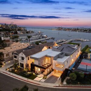 Mary Fitzgerald Instagram - Just Listed - 2201 Bayside Dr. - $27,995,000

5 Beds / 9 Baths / 9,129 Sq. Ft. / 11,921 Lot Size

This newly constructed custom estate offers exclusive Corona Del Mar waterfront living with intricate design touches and a harmonious blend of natural stone and wood elements. Consisting of 5 ensuite bedrooms and 9 bathrooms and boasting approximately 50 feet of private beachfront, it caters to water enthusiasts and offers shared ownership of one of the longest private docks on the west coast, capable of accommodating multiple yachts up to 100ft in length. Upon arrival, you will be greeted by meticulously landscaped surroundings, a striking grand pivot door, and a double height foyer that sets the tone for the residence. Inside, the space boasts European wide plank bleached oak flooring by Gaetano, illuminated floating staircases, and expansive glass features that fill the approximately 9,129 square feet of interiors with an abundance of natural light. The property seamlessly connects to its surroundings through slide-away pocket doors that open onto a heated patio, a zero-edge saltwater pool and spa, and a courtyard featuring a built-in Lynx Grill. The kitchen features custom Honed Calcatta Vagli slab countertops and backsplash, a 55" La Canche designer stove imported from Paris, a butler's pantry, and stained white oak cabinetry. Convenience is paramount, with a Waupaca elevator servicing all four floors, including the lower level, which encompasses a media area, a dry bar, and temperature controlled wine room. Upstairs, the owner's suite presents a heated wraparound balcony with mesmerizing water views, a living space with a fireplace, and two spa-like bathrooms, each complemented by its own walk-in closet. The top level reveals a lounge area that opens onto a rooftop deck with grass and sweeping views of the Newport Beach Harbor offering limitless ocean-view entertaining. Equipped with cutting-edge technology, the property also includes a nearly 3,000 sq. ft., 6+ car garage with epoxy flooring.

Listed by @briancharlesfurstenfeld @mskaylacardona @jasonoppenheim 

#theoppenheimgroup #realestate #luxurylifestyle #fyp #newlisting