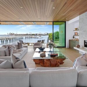 Mary Fitzgerald Instagram - Just Listed - 2201 Bayside Dr. - $27,995,000

5 Beds / 9 Baths / 9,129 Sq. Ft. / 11,921 Lot Size

This newly constructed custom estate offers exclusive Corona Del Mar waterfront living with intricate design touches and a harmonious blend of natural stone and wood elements. Consisting of 5 ensuite bedrooms and 9 bathrooms and boasting approximately 50 feet of private beachfront, it caters to water enthusiasts and offers shared ownership of one of the longest private docks on the west coast, capable of accommodating multiple yachts up to 100ft in length. Upon arrival, you will be greeted by meticulously landscaped surroundings, a striking grand pivot door, and a double height foyer that sets the tone for the residence. Inside, the space boasts European wide plank bleached oak flooring by Gaetano, illuminated floating staircases, and expansive glass features that fill the approximately 9,129 square feet of interiors with an abundance of natural light. The property seamlessly connects to its surroundings through slide-away pocket doors that open onto a heated patio, a zero-edge saltwater pool and spa, and a courtyard featuring a built-in Lynx Grill. The kitchen features custom Honed Calcatta Vagli slab countertops and backsplash, a 55" La Canche designer stove imported from Paris, a butler's pantry, and stained white oak cabinetry. Convenience is paramount, with a Waupaca elevator servicing all four floors, including the lower level, which encompasses a media area, a dry bar, and temperature controlled wine room. Upstairs, the owner's suite presents a heated wraparound balcony with mesmerizing water views, a living space with a fireplace, and two spa-like bathrooms, each complemented by its own walk-in closet. The top level reveals a lounge area that opens onto a rooftop deck with grass and sweeping views of the Newport Beach Harbor offering limitless ocean-view entertaining. Equipped with cutting-edge technology, the property also includes a nearly 3,000 sq. ft., 6+ car garage with epoxy flooring.

Listed by @briancharlesfurstenfeld @mskaylacardona @jasonoppenheim 

#theoppenheimgroup #realestate #luxurylifestyle #fyp #newlisting