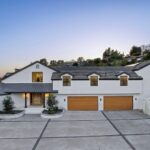 Mary Fitzgerald Instagram - Just Listed In Villa Park - 18541 Valley Dr. - $5,495,000 8 Beds / 8 Baths / 10,329 Sq. Ft. / 39,335 Lot Size Located in Orange County's prestigious Villa Park and set behind private gates on an elevated lot, this newly remodeled contemporary estate offers breathtaking views of the city and Catalina Island. Boasting 8 bedrooms, 8 baths, and over 10,000 sq. ft. of living space on an expansive nearly 40,000 sq. ft. lot, the home comes replete with every amenity necessary for luxe living and top-class entertainment. Enter into a light-filled foyer with double-height ceilings and a wrap-around staircase accentuated by a chandelier. The main level enjoys an open floor plan with flowing spaces accentuated by White Oak flooring. The cozy living area is framed by a wooden feature wall and marble fireplace. Adjacent to this, the dining area is replete with its own wooden accent feature wall, custom-built buffet cabinets, and designer chandelier. The chef's kitchen features a full set of Thermador appliances, custom White Oak cabinetry, leathered granite backsplash and countertops, and a large cascading center island with seating. A spacious breakfast nook with additional storage and views completes the kitchen area, with its own semi-private room with a fireplace perfect for an additional family/TV room. This entire level enjoys access to the sweeping yard with a resort-style pool and spa with smart controls, a Cantilever pergola with a rainfall feature, and a built-in BBQ, all enjoying more gorgeous views. The split-level primary suite enjoys high ceilings, a sitting area, fireplace, private balcony with sprawling unobstructed views, his-and-her closets, and a breathtaking spa-like bathroom with dual vanity, touchless heated smart toilet, large walk-in steam shower, freestanding bathtub, and sauna. Additional amenities include a secondary owner's suite with a large bathroom, a 1,000 sq. ft. theater with 11.2 Dolby Atmos system, two office spaces, a gym with massage room (could be wine or cigar room), a 4-car garage, and a 20-car motor court. Listing Agents: @alexanderhuerta_ @jasonoppenheim