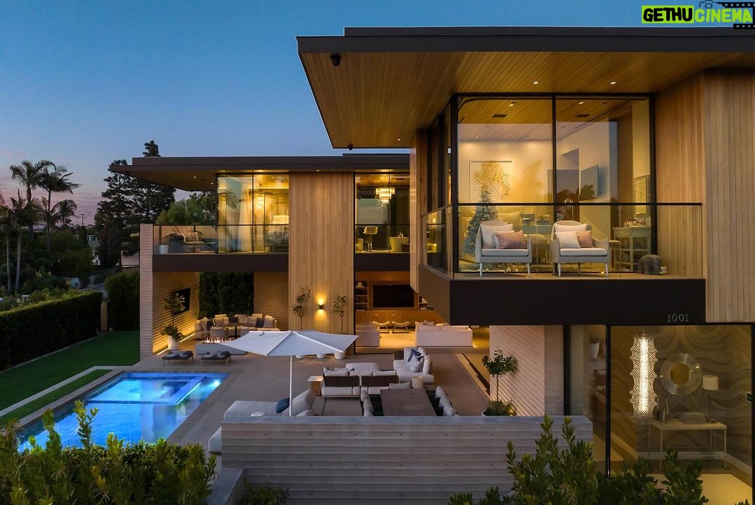 Mary Fitzgerald Instagram - Just Listed in Manhattan Beach - 1001 1st St. - $29,900,000 6 Bed / 9 Bath / 9,479 Sq. Ft. The most impressive and high-quality Contemporary estate ever built in Manhattan Beach, featuring panoramic ocean views from every room. After a laborious multi-year build, this approximately 9,500 sq. ft. showstopper seamlessly fuses glass, cedar, and concrete into a triumphant architectural tour de force with a sense of permanence and grandeur. Integral to the structure and aesthetic of the home, the scalloped concrete walls seen on the exterior and interior walls resemble an undulating wave-like texture accomplished by custom milled formwork which complement the surrounding Pacific landscape. Custom cedar clads the remaining walls and ceilings, bringing warmth and visual impact throughout the sleek space. Double-height ceilings and oversized automated Otiima pocketing doors and windows create a sense of expansion within, as the home seamlessly unfolds into an extensive beautifully landscaped outdoor terrace and pool/spa perfect for California living. An additional shaded patio with fireplace is created by the deep cedar overhangs from the upper floor and the roof. Generously nestled on an extra-wide corner lot, the home is replete with 6 bedrooms plus an additional office/nursery, 9 bathrooms, home theater, game room, wine cellar, wet bar, and gym, with architecture by Laney LA. Additional amenities include 48 solar panels with Tesla Powerwalls, elevator, 14 zone A/C technology platform system, Control4 home automation, and 3-car garage with additional driveway parking. An exceptionally rare opportunity to own a meticulously crafted beach estate with soul and sophistication.