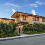 Mary Fitzgerald Instagram - Just Listed in Manhattan Beach - 1001 1st St. - $29,900,000 6 Bed / 9 Bath / 9,479 Sq. Ft. The most impressive and high-quality Contemporary estate ever built in Manhattan Beach, featuring panoramic ocean views from every room. After a laborious multi-year build, this approximately 9,500 sq. ft. showstopper seamlessly fuses glass, cedar, and concrete into a triumphant architectural tour de force with a sense of permanence and grandeur. Integral to the structure and aesthetic of the home, the scalloped concrete walls seen on the exterior and interior walls resemble an undulating wave-like texture accomplished by custom milled formwork which complement the surrounding Pacific landscape. Custom cedar clads the remaining walls and ceilings, bringing warmth and visual impact throughout the sleek space. Double-height ceilings and oversized automated Otiima pocketing doors and windows create a sense of expansion within, as the home seamlessly unfolds into an extensive beautifully landscaped outdoor terrace and pool/spa perfect for California living. An additional shaded patio with fireplace is created by the deep cedar overhangs from the upper floor and the roof. Generously nestled on an extra-wide corner lot, the home is replete with 6 bedrooms plus an additional office/nursery, 9 bathrooms, home theater, game room, wine cellar, wet bar, and gym, with architecture by Laney LA. Additional amenities include 48 solar panels with Tesla Powerwalls, elevator, 14 zone A/C technology platform system, Control4 home automation, and 3-car garage with additional driveway parking. An exceptionally rare opportunity to own a meticulously crafted beach estate with soul and sophistication.