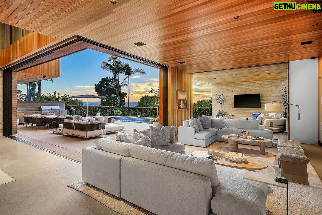 Mary Fitzgerald Instagram - Just Listed in Manhattan Beach - 1001 1st St. - $29,900,000 6 Bed / 9 Bath / 9,479 Sq. Ft. The most impressive and high-quality Contemporary estate ever built in Manhattan Beach, featuring panoramic ocean views from every room. After a laborious multi-year build, this approximately 9,500 sq. ft. showstopper seamlessly fuses glass, cedar, and concrete into a triumphant architectural tour de force with a sense of permanence and grandeur. Integral to the structure and aesthetic of the home, the scalloped concrete walls seen on the exterior and interior walls resemble an undulating wave-like texture accomplished by custom milled formwork which complement the surrounding Pacific landscape. Custom cedar clads the remaining walls and ceilings, bringing warmth and visual impact throughout the sleek space. Double-height ceilings and oversized automated Otiima pocketing doors and windows create a sense of expansion within, as the home seamlessly unfolds into an extensive beautifully landscaped outdoor terrace and pool/spa perfect for California living. An additional shaded patio with fireplace is created by the deep cedar overhangs from the upper floor and the roof. Generously nestled on an extra-wide corner lot, the home is replete with 6 bedrooms plus an additional office/nursery, 9 bathrooms, home theater, game room, wine cellar, wet bar, and gym, with architecture by Laney LA. Additional amenities include 48 solar panels with Tesla Powerwalls, elevator, 14 zone A/C technology platform system, Control4 home automation, and 3-car garage with additional driveway parking. An exceptionally rare opportunity to own a meticulously crafted beach estate with soul and sophistication.