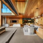 Mary Fitzgerald Instagram - Just Listed in Manhattan Beach - 1001 1st St. - $29,900,000 6 Bed / 9 Bath / 9,479 Sq. Ft. The most impressive and high-quality Contemporary estate ever built in Manhattan Beach, featuring panoramic ocean views from every room. After a laborious multi-year build, this approximately 9,500 sq. ft. showstopper seamlessly fuses glass, cedar, and concrete into a triumphant architectural tour de force with a sense of permanence and grandeur. Integral to the structure and aesthetic of the home, the scalloped concrete walls seen on the exterior and interior walls resemble an undulating wave-like texture accomplished by custom milled formwork which complement the surrounding Pacific landscape. Custom cedar clads the remaining walls and ceilings, bringing warmth and visual impact throughout the sleek space. Double-height ceilings and oversized automated Otiima pocketing doors and windows create a sense of expansion within, as the home seamlessly unfolds into an extensive beautifully landscaped outdoor terrace and pool/spa perfect for California living. An additional shaded patio with fireplace is created by the deep cedar overhangs from the upper floor and the roof. Generously nestled on an extra-wide corner lot, the home is replete with 6 bedrooms plus an additional office/nursery, 9 bathrooms, home theater, game room, wine cellar, wet bar, and gym, with architecture by Laney LA. Additional amenities include 48 solar panels with Tesla Powerwalls, elevator, 14 zone A/C technology platform system, Control4 home automation, and 3-car garage with additional driveway parking. An exceptionally rare opportunity to own a meticulously crafted beach estate with soul and sophistication.