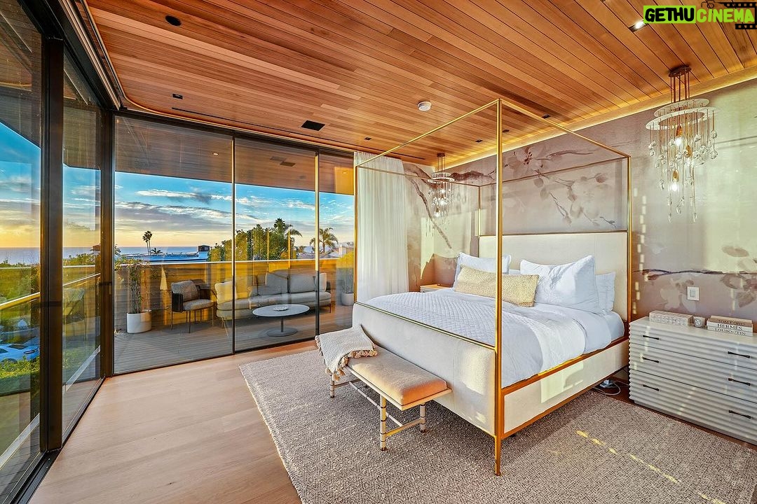 Mary Fitzgerald Instagram - Just Listed in Manhattan Beach - 1001 1st St. - $29,900,000 6 Bed / 9 Bath / 9,479 Sq. Ft. The most impressive and high-quality Contemporary estate ever built in Manhattan Beach, featuring panoramic ocean views from every room. After a laborious multi-year build, this approximately 9,500 sq. ft. showstopper seamlessly fuses glass, cedar, and concrete into a triumphant architectural tour de force with a sense of permanence and grandeur. Integral to the structure and aesthetic of the home, the scalloped concrete walls seen on the exterior and interior walls resemble an undulating wave-like texture accomplished by custom milled formwork which complement the surrounding Pacific landscape. Custom cedar clads the remaining walls and ceilings, bringing warmth and visual impact throughout the sleek space. Double-height ceilings and oversized automated Otiima pocketing doors and windows create a sense of expansion within, as the home seamlessly unfolds into an extensive beautifully landscaped outdoor terrace and pool/spa perfect for California living. An additional shaded patio with fireplace is created by the deep cedar overhangs from the upper floor and the roof. Generously nestled on an extra-wide corner lot, the home is replete with 6 bedrooms plus an additional office/nursery, 9 bathrooms, home theater, game room, wine cellar, wet bar, and gym, with architecture by Laney LA. Additional amenities include 48 solar panels with Tesla Powerwalls, elevator, 14 zone A/C technology platform system, Control4 home automation, and 3-car garage with additional driveway parking. An exceptionally rare opportunity to own a meticulously crafted beach estate with soul and sophistication.