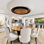 Mary Fitzgerald Instagram - Just Listed in Carlsbad - 7229 Almaden Ln. - $5,995,000 6 Beds / 7 Baths / 6,226 Sq. Ft. / 24,829 Lot Size As you enter this grand estate beyond a long, private driveway, you are enveloped in unparalleled luxury within the residence, gracefully situated along the 14th fairway of the La Costa Golf Course, recently revitalized by acclaimed golf-course architect Gil Hanse. After crossing a bridge above a beautiful koi pond leading to a grand doorway, a tranquil ambiance envelops you, marked by a magnificent water wall that establishes Feng Shui harmony. This residence, which boasts panoramic views of the esteemed golf course, seamlessly integrates indoor and outdoor living, with each room effortlessly connecting to the expansive yard. The gourmet kitchen is a culinary sanctuary equipped with state-of-the-art Gaggenau appliances. Enjoy dynamic gatherings in the Teppanyaki room, featuring a professional cooktop and custom copper hood that transforms into a poker table and cigar lounge. A smart home system allows for effortless control of lighting, sound, and a nine-foot drop-down theater screen in the living room. Additional features include an outdoor humidor, wine bar, wood-fired pizza oven, and a fully lit outdoor bar with heated countertops. Entertainment reaches new heights with a private putting green and a newly tiled pool/spa accompanied by a water wall featuring a fire element. The outdoor area extends to a covered full catering Viking kitchen equipped with a large BBQ, smoker oven, refrigerator, dishwasher, and warming drawers. For golf enthusiasts, the property offers private automatic gates for golf cart access directly onto the green, providing a rare and exclusive experience. Ample parking for 10+ cars on a long driveway and additional three car garage. Listed By: Jason Oppenheim - DRE#: 01983697 Diana Harton - DRE#: 02021702 Mary Bonnet - DRE#: 01800489 Matthew Peters - DRE#: 01901784