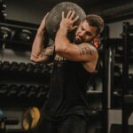 Mat Fraser Instagram - The HARD WORK may not PAY OFF today or tomorrow, but eventually it will. I get asked about the origin story often. The mantra HWPO has been a part of my life for a long time — before I even found CrossFit. Since then, it’s bled into everything that I do in competing, coaching, at @hwpotraining, my family, and everything in between. How does #HWPO apply to your life? COMMENT BELOW.