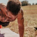 Mat Fraser Instagram - Ain’t nothin’ like shaking off the travel with a good @hwpotraining SWEAT. Those workouts are no joke, especially when @harrypalley’s coaching. And, you knowww I gotta give it my all on those knee tucks when Easy E is watching on the sideline. #HWPO