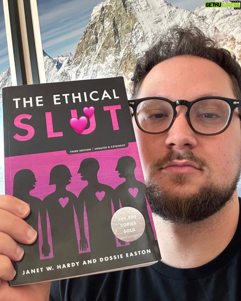 Matt McGorry Instagram - "The Ethical Sl🫦t" by Janet W. Hardy & Dossie Easton Where my polyamorous/non-monogamous ethical sl🔥ts at?? 🤗🥹🤗🥹 I’ve been polyamorous for a few years now and have read quite a few books about it. But this was the first book that I read that really started me on the path. The funny thing is, I had it on my bookshelf for years as I identified as monogamous but for some reason I never read it. Perhaps I subconsciously knew that it would start to open some doors for me that would change my life, and that there would be no going back from. And that somehow, I just didn't feel ready. There is nothing wrong with monogamy itself. The same way there is nothing wrong with heterosexuality. But the problem is where the compulsory aspects of it lie. For example, I do believe that a lot more people would explore and step outside of monogamy (and heterosexuality for that matter) if it were not so heavily stigmatized to do so. While the social norms are shifting, there is still much work to be done transforming the systems and cultural beliefs that shame, pressure and coerce people into thinking that monogamy is the only real viable choice. It's only been a couple of years since I realized that polyamory was for me and it took me most of that time to feel comfortable fully embracing it in a way where I would be okay with people knowing that about me, as a public figure. For me, reading is an essential piece of how I learn about new things that I'm passionate about. And because we don't often see examples of how to have conversations about these issues, it can feel really challenging to know where to start. I believe that is the magic of books. For those who don't feel comfortable just jumping into shit 🙋🏻‍♂️, it gives us the opportunity to get some clarity about our desires and to build the capacity, skills, and tools that allow us to express those needs. May we all work towards the courage of giving space for and identifying our deepest desires and being able to put them into words. My Booklist: bit.ly/mcgreads (link in bio) #McGReads
