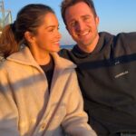 Matthew Hussey Instagram - This first picture was taken the night Audrey and I met! How crazy is it that we have a picture from the night we met! A friend of Audrey’s randomly took the photo of us, and then sent us the photo 2 years later when they found it on their phone and realized we had become serious! We’d literally met for the first time an hour before this picture was taken. Just two lil babies flirtin’. I wasn’t even going to go to this party. I just happened to be back in London for Christmas that week and a friend of mine persuaded me to go. When we were on the way, that same friend told me: “There is a girl who will be there that all the boys are in love with, and we’re all afraid you’re going to steal her”. He didn’t tell me who it was when we walked in, but within minutes I knew. I was glued to the tv in the bar at the beginning of the evening because there was this big boxing match on that night, but I kept making eye contact with her the whole time. She sidled up next to me, started watching the tv, and then asked me a question about the boxing (something she has never shown an interest in since). And that was that. We talked for 8 hours that night (literally). David Brookes once said: “A marriage is a 50 year conversation. Have I met a person who I can talk to for that length of time?” I have, which is why I asked this incredible human being to marry me. I can’t believe I get to build a life with someone as amazing as you. I’m stupidly excited to do it all with you—to be grown ups and do all the grown up things, while deep down staying just two lil babies flirtin’. Happy Valentine’s Day @theaudreyhussey. I love you forever. ❤️