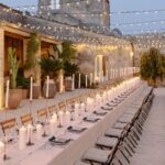 Matthew Hussey Instagram - I want to give a huge thank you to the people behind our wedding, @lyndenlane. @lyndenlane are renowned event planners and interior designers, but I came across them because they planned my friend’s wedding. Live events are something I've had a passion for since starting my company, and my standards are HIGH! But this was one of the most beautiful events I’d ever seen. As a result, we had our hearts set on working with them and they completely blew us away . . . 🕯️ When Audrey and I expressed we didn't want to spend a fortune on flowers, they went out and bought an insane number of candles and hung string lighting for a third of the price. The result was absolutely breathtaking (see pic). 🍴They brought their own silverware in an extra (and undoubtedly VERY heavy) piece of luggage they lugged all the way to Italy because they preferred it to the silverware the venue provided. 🪡 When Audrey's dress broke right before the ceremony, they calmly sewed her back into it on the spot! 🪩 They anticipated Audrey's feet hurting during the party so had bought ahead of time a pair of comfy sneakers for her to change into late in the evening. 🤍 They learned all our family members' names and faces before the wedding day so they could make each and every one of them feel special when they got there. This is to name but a few unbelievable details-(remember what I’ve said before about the trash cans? [IYKYK] Well, @lyndenlane show what this looks like in action). And this is just what they did on the weekend. They also spent a year executing our dream vision for our wedding, as well as helping us understand what that was. It was extraordinary. We learned so much from working with them that I'm now thinking of doing an entire podcast with them on how to plan an unforgettable event—whether it’s a wedding, a special birthday party, or any kind of seasonal event. What do you think? Leave me a comment! Oh, and if you're planning a once-in-a-lifetime event, DM them directly at @lyndenlane. I cannot recommend them highly enough. From the bottom of our hearts, thank you Lyndsey, Layne, Barbie & your incredible team. We love you guys ♥️ Stunning 📸’s by @sarahfalugo.co