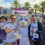 Matthew Lewis Instagram – Premier League Fan Fest at @universalorlando with @michaelbridges8 and the Kop Cat himself. 

Always a laugh supporting @leedsunited and the @premierleague out here in 🇺🇸. It’s a totally free event and with Bridgey in town, we all got our money’s worth.