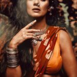 Megha Gupta Instagram - . The Divine Masculine wants to protect and provide. The Divine Feminine wants to nurture and birth. He is consciousness, She, the Universe. He is the sky, She, the weather. Feminine Energy Allows us to turn within and examine the looping patterns that our wounding causes us to repeat. She shows us how we have been neglecting our truth and guides us toward living from our hearts. Masculine Energy Provides us with the will, drive, and strength to exit these patterns of wounding. He takes us by the hand and encourages us to release whatever is not in our best interest and to instead claim our destiny. When they come together in union, these energies bring us freedom. The Balance is beautiful. Shot by the amazing @sanjeevkumarphotography Look brought together by @chocolate_wiggle #divinemasculine #divinefeminine #tribal #nurture #nature #consciousness #universe #yinyang #ShivShakti #indian #india #meghagupta #ootd #tribaljewellery