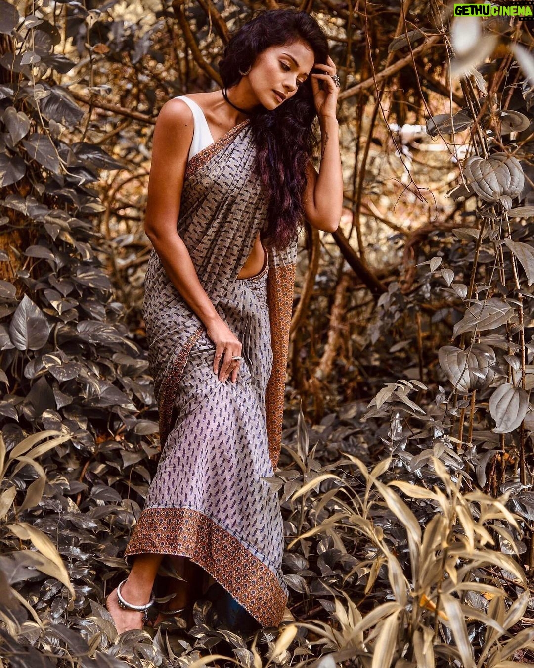 Megha Gupta Instagram - बंजारन | Banjaran | /banjārā/ mn. gypsy countable noun. A gypsy is a member of a race of people who travel from place to place in caravans, rather than living in one place. Having changed many schools, cities, countries and thus many friends as I was growing up, I tried to hold on. I tried to belong, only to come to the conclusion, that I was never meant to. I am a disruptor, a major one at that. I question, I’m happy to go against the tide, even if it means being alone in that journey. The manipulators hate me, they can’t manipulate me. I’m happy to be hated in that context. I’d rather be hated, be my true authentic self and be chosen for that than be someones’ yes (wo)man and be under their umbrella. I’ve found my tribe and we choose each other, everyday. We find support in one another and cherish what we have, always massively grateful for what we are building together. It’s slow, steady, and solid. If you made it this far, you are chosen, and cherished 💜 When I see these images, I’m reminded of the time we were putting this together. Flow state. And I didn’t die. Sanjeev and Pixie know what I am referring to. 📷 @sanjeevkumarphotography MUA @chocolate_wiggle #tribal #indian #belong #ootd #jewellery #india #saree #indianwear #goa #shoot #tribesofindia #gypsylife