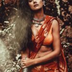 Megha Gupta Instagram - . The Divine Masculine wants to protect and provide. The Divine Feminine wants to nurture and birth. He is consciousness, She, the Universe. He is the sky, She, the weather. Feminine Energy Allows us to turn within and examine the looping patterns that our wounding causes us to repeat. She shows us how we have been neglecting our truth and guides us toward living from our hearts. Masculine Energy Provides us with the will, drive, and strength to exit these patterns of wounding. He takes us by the hand and encourages us to release whatever is not in our best interest and to instead claim our destiny. When they come together in union, these energies bring us freedom. The Balance is beautiful. Shot by the amazing @sanjeevkumarphotography Look brought together by @chocolate_wiggle #divinemasculine #divinefeminine #tribal #nurture #nature #consciousness #universe #yinyang #ShivShakti #indian #india #meghagupta #ootd #tribaljewellery
