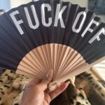Mel B Instagram – When your friend knows your vibe so well, they gift you the ultimate ‘express yourself’ accessory. 🖤🤘 Thanks to the fabulous @joancollinsdbe for this bold statement piece – because sometimes a ‘fuck off’ fan speaks louder than words! 😂✨ #GiftGoals #JoanCollinsApproved