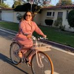Melissa McCarthy Instagram - If only I could always match my jumpsuit to my @bluejaybikes 😂💕 I muted my rendition of the Queen song I put in the background of this video (you’re welcome). To all of my friends reading this — no you didn’t — because you’re all getting bikes for the holidays! Happy Friday 🎉
