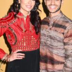 Mena Massoud Instagram – @Dharma.Gin just launched early this summer and we are so proud of our very first event to celebrate Diwali with @nokkam.co. Diwali is the Festival of Lights, celebrating good over evil. Wishing you all a fulfilling and peaceful holiday season 🖤✨🙏🏽🧡

From our Cosmic Spirit to yours, 
– Emily & Mena 
Owners & Founders of Dharma Gin Los Angeles, California