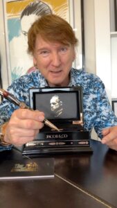 Michael Blakey Instagram - Have you ever seen a pen as beautiful as this? This is the newly released @jacobandco Godfather pen made to commemorate the 50th anniversary of the epic movie. Once again @jacobandco have created something so incredibly beautiful and innovative, it immediately puts a big smile on your face … ~~~~~~~~~~ In it to win it ! ~~~~~~~~~~ #producermichael #inittowinit #jacobandco #godfather #pen #writinginstruments #enamel #coffin #innovative Beverly Hills, California