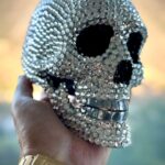 Michael Blakey Instagram - Happy Saturday ! Halloween is coming and this amazing skull created by @coolasfocart in collaboration with @cocoleafurniture is perfect to spook your friends. It’s made entirely from melted brass and hand set Swarovski crystals. Check out some of their other creations, I think you’ll find some really fun and unique pieces and give them a follow… Have a great weekend 🥂 ~~~~~~~~~~ In it to win it ! ~~~~~~~~~~ #producermichael #inittowinit #skull #swarovski #scary #spooky #fun #weekend #custom #art Beverly Hills, California
