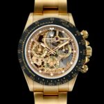 Michael Blakey Instagram - What a way to end the week! Check out this incredible new release from @skeletonconceptofficial . The creation was commissioned by a professional art connoisseur who particularly affectionates @gloriagalleryparis , a contemporary art gallery in Paris. This customized Daytona’s hand polished movement has been completely crafted from 18kt gold with both satin and polished surfaces, sub-dials painted in contrasting rich racing-green and the bezel in forged carbon. This is a limited “off series” edition of just 15 pieces. Check out @skeletonconceptofficial for more information. ~~~~~~~~~~ In it to win it ! ~~~~~~~~~~ Paris, France