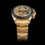Michael Blakey Instagram - What a way to end the week! Check out this incredible new release from @skeletonconceptofficial . The creation was commissioned by a professional art connoisseur who particularly affectionates @gloriagalleryparis , a contemporary art gallery in Paris. This customized Daytona’s hand polished movement has been completely crafted from 18kt gold with both satin and polished surfaces, sub-dials painted in contrasting rich racing-green and the bezel in forged carbon. This is a limited “off series” edition of just 15 pieces. Check out @skeletonconceptofficial for more information. ~~~~~~~~~~ In it to win it ! ~~~~~~~~~~ Paris, France