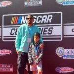 Michael Ealy Instagram - It's important for me to show my kids the possibilities in life. Not just the things I never had but the experiences. Exposure is key. Last Sunday we were given a great opportunity to see our first ever @Nascar race! He got to meet incredible drivers like @bubbawallace and @kylelarson we met members of the pit crews who couldn't have been more gracious and fun! This won't be our last race.... #NASCAR knows how to throw a party! Big thanks to Erica over at Nascar for showing us the ropes and introducing us to the NASCAR family. Thanks to Kevin Williams the CEO of Wisepower for sponsoring such an event and being nice to my kid! #wisepower400 #nascaronfox @autoclubspeedway #californialove