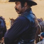 Michael Jai White Instagram - BTS of #outlawjohnnyblack. WHO CAUGHT THIS? As with Black Dynamite and anything I write & direct, I hide layers within the movie for fans to uncover for years to come. With this year ending I’d like to thank all who supported OJB and continue to support my brand by giving you this Easter Egg. Outside of my hardcore martial artists I wonder… WHO CAUGHT THIS? #happyholidays #happynewyear #familytime #faith #movies #enterthedragon #brucelee #michaeljaiwhite
