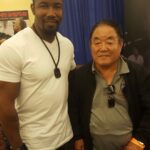 Michael Jai White Instagram - Yesterday the Martial Arts world lost a giant with the passing of Sensei, #FumioDemura. He was one of the world’s highest ranking Karateka, known as “The Real Mr. Miyagi.” He trained every day and was as humble as he was exalted! I had the honor or training with him and casting him as an elite VIP Guest in Blood And Bone’s final fight. As a child, I bought and studied all of his books. I speak for many when I say, he will be terribly missed! OSU! Sensei, Demura! #martialarts #sensei #honor #karate #karateka #fumiodemurasensei #michaeljaiwhite