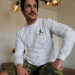 Michael Trevino Instagram - Thinking about the crew of @cwroswellnm and wondering when we’ll all be back together working on season 3. Given the world’s current situation @cadlymack and the cast have started a fund to keep our crew afloat as industry jobs are put on hold. If you’d like to purchase this super sweet long sleeve I’m wearing hit the link in my bio where you’ll find all kinds of merchandise. 100% of proceeds from sales of these shirts go to A Little Alien, a 501(c)(3) nonprofit set up to ease financial hardship inflicted on our beloved crew by the Covid-19 crisis. Be safe everyone. Thank You!