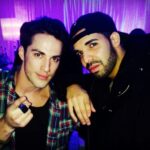 Michael Trevino Instagram - Happy Birthday to my best friend in the whole world @champagnepapi. We going to #tbt with my bloodshot eyes all the way to 2013 at the “Would You Like a Tour?” Concert. We use to love to finger point in photos 👈🏼☝🏼👉🏼👇🏼 Miss you buddy! #bestfriends #ovo Atlanta, Georgia