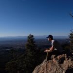 Michael Trevino Instagram - Top of Atalaya Mountain overlooking Santa Fe, New Mexico last year. Eager to head back to the desert and start work on season 2 of @cwroswellnm. see you soon 👽