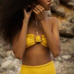 Michelle Keegan Instagram - So this has been over 2 YEARS in the making…I can’t believe it’s finally launch day!! 🥳 I’ve always wanted to create my very own swimwear range that everybody feels comfortable in but with a twist. It was completely worth the wait in order to perfect a multi-way bikini that you can wear in 20 different ways, and that you can wear from the beach to the bar 🍹🌴 The name ‘Orfila Bee’ @orfilabee is so special to me as Orfila was my Grandma’s maiden name and she remains one of the biggest influences in my life. The ‘Bee’ is to represent the city in which I was proudly born and raised in 🐝 Hope you love it as much as I do. 🤍💛🖤 #orfilabee #swimwear #beachwear #launch #bikini (AD own brand)