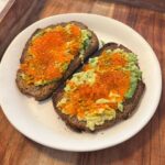 Michelle Pfeiffer Instagram – Breakfast of champions! Riverence Trout Eggs, Avocado, Chestnut Bread, Turmeric & Cayenne Pepper. 😋