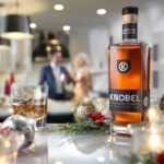Mike Rowe Instagram - A quick thanks to everyone who enjoyed a wee dram of @knobelwhiskey over the holiday. I received hundreds of photos from satisfied customers, along with a flurry of reviews that made me proud to see my Pop’s name preserved for posterity. Thanks for all the great feedback. Many of you have wondered if and when Knobel will make its way onto a shelf near you, and I’m happy to say we’re making progress, but it’s a slog. If the liquor business had a tagline, it would be, “Go ahead, try to launch a new brand. We dare you…” Nevertheless, we're now in Wyoming, Virginia, Tennessee, Maryland, Delaware, DC, and most recently Michigan. Also, the original juice is finally back in stock and in pretty good supply. However, the Rickhouse Edition was so popular as a temporary replacement, we’ve decided to replenish those stocks as well. (Rickhouse is 95 proof, the original is 90 proof.) Some new gift offerings are currently available along with just the juice, for those of you who would just as soon dispense with the hoop-de-doodle. In the meantime, I’m still allowed to ship directly to 28 (enlightened) states. A portion of all the online sales will continue to benefit @mikeroweWORKS, and that money will be well spent on our next work ethic scholarship program, coming up in a month or two. More information on that later. Carry on. Link in bio