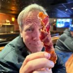 Mike Rowe Instagram - There’s a place in Casper, WY called @silverfoxcasper where they tie bacon into knots and put them in Bloody Mary’s. This is an excellent idea and should be replicated far and wide. I had dinner there last night but didn’t pay for it because one of the diners picked up my tab. This was both very generous and very unnecessary, and when I walked over to thank the gentleman, I learned from Victoria, my excellent server, that he had left a few moments before and wished to remain anonymous. “Well, crap,” I said. “How am I supposed to say thanks?” “He’s a regular,” said Victoria. “I’ll tell him next time he comes in.” “What’s his name?” I asked. Victoria thought for a moment. “You know, I’m not sure. Everybody here just calls him “Tall Cowboy.” So, if you’re out there, Tall Cowboy, this is the photo I would have taken of the two of us, which is precisely where you were sitting when you bought my dinner. Also attached is the receipt, which I’ve signed and asked Victoria to give to you next time you dine there or enjoy a Bloody Mary with a piece of knotted bacon. Till then, I remain much obliged. Casper, Wyoming