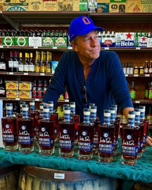 Mike Rowe Instagram - I’m not posting this photo to persuade you to purchase an autographed bottle of my grandfather’s delicious whiskey, the purchase of which benefits the @mikeroweworks foundation and can be facilitated at knobelspirits.com. That would be heavy-handed, and possibly even tasteless. I’m posting this photo because, for the first time in a long time, the Orioles are on fire! Go O’s!