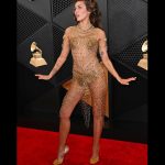 Miley Cyrus Instagram - This dress took 675 hours of artisanal hand crafted work, 14,000 golden safety pins & is adorned with singularly selected French antique beads. Thank you.