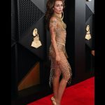 Miley Cyrus Instagram - This dress took 675 hours of artisanal hand crafted work, 14,000 golden safety pins & is adorned with singularly selected French antique beads. Thank you.