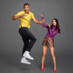 Miranda Cosgrove Instagram - Still can’t believe how tall @gronk is next to me 🤣 See you all April 9th for the @kidschoiceawards 💚