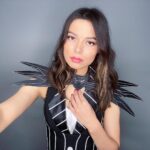 Miranda Cosgrove Instagram - Got in one last costume before Halloween is completely over 💀I’m Jack Skellington. Also swipe to the last picture for a weird surprise. My cat thought the picture hanger on the wall was a bug and soared to new heights to try to reach it. ☠️😂