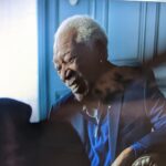 Morgan Freeman Instagram - They say to smile - it makes people wonder what you’re up to…can you guess who’s making me laugh on set? #BehindTheScenes