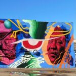 Morgan Freeman Instagram - Last year a crew of inspiring folks came together as a collective through the @DeltaArtsDistrict to pay homage to Clarksdale’s musical history on the South Wall of @gzbluesclub, with a mural by devin.liston. This bright mural reminds all of the beauty of Mississippi, Blues, and our community. 💙 📷:@revilopark Artist: devin.liston, “Midnight at the Crossroads” Clarksdale, Mississippi